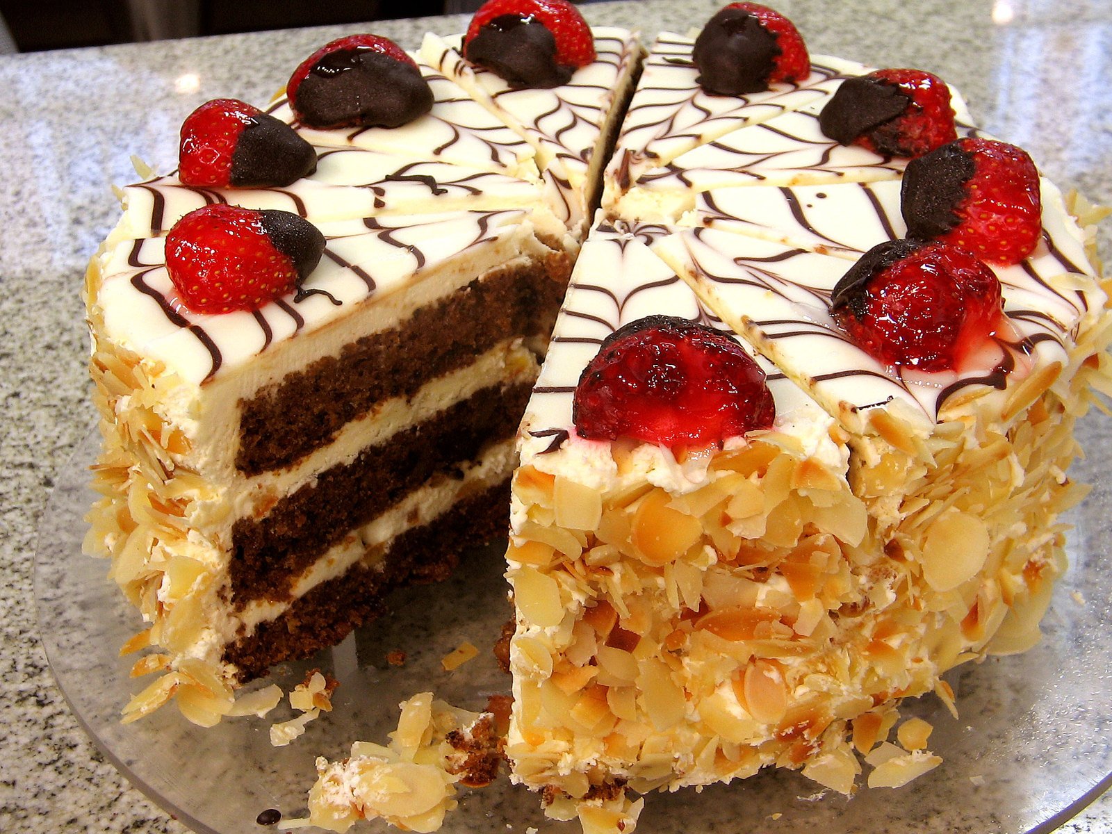 A Bakewell tart style cake with strawberry decorations